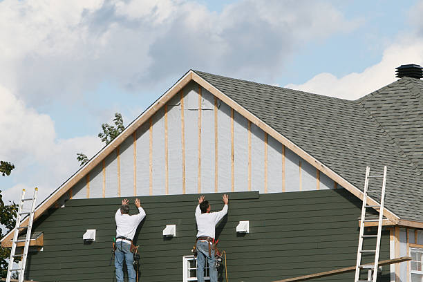 Professional Siding technician working in Bowie, MD